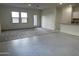 Spacious living area with tile and carpet flooring and bright natural light at 1891 E Bucking Bronco Dr, San Tan Valley, AZ 85140