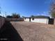 A spacious backyard is enclosed by a fence, offering privacy and security at 3143 W Glendale Ave, Phoenix, AZ 85051