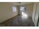 Bright bedroom with wood-look floors and natural lighting at 3143 W Glendale Ave, Phoenix, AZ 85051