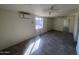 Bright bedroom featuring a ceiling fan, and ample natural light at 3143 W Glendale Ave, Phoenix, AZ 85051