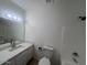 Bathroom featuring tile flooring, a toilet, and a vanity with a mirror at 4332 W Ocotillo Rd # 206, Glendale, AZ 85301