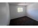 A view of the bedroom featuring carpeted floors, ample natural light, and neutral walls at 4332 W Ocotillo Rd # 206, Glendale, AZ 85301