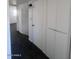 Hallway with carpeted floors, white walls, and a closet at 4332 W Ocotillo Rd # 206, Glendale, AZ 85301