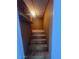 Carpeted stairway with shelves overhead at 4332 W Ocotillo Rd # 206, Glendale, AZ 85301