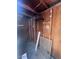 Interior of storage room, showcasing exposed framing and shelving at 4332 W Ocotillo Rd # 206, Glendale, AZ 85301