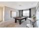 Game room featuring a pool table, high-top tables, and neutral colors at 4977 E Umber Rd, San Tan Valley, AZ 85143