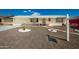 Inviting single-story home with desert landscaping, walkway, and covered porch at 509 N 56 St, Mesa, AZ 85205