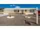 Inviting single-story home with desert landscaping, walkway, and covered porch at 509 N 56 St, Mesa, AZ 85205