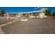 Charming single-story home with desert landscaping, walkway, and covered porch at 509 N 56 St, Mesa, AZ 85205