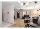 Bright living room with neutral carpeting, stylish seating, and an abundance of natural light at 509 N 56 St, Mesa, AZ 85205
