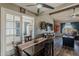 Cozy dining area with stylish furniture and decor, seamlessly connected to the living room for easy entertaining at 6433 E University Dr, Mesa, AZ 85205