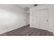 Spacious bedroom with closet featuring sliding doors at 14241 W Bronco Trl, Surprise, AZ 85387
