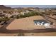 Aerial view of a newly built home on a spacious lot, showcasing the property's generous outdoor space and landscaping potential at 15582 W Jomax Rd, Surprise, AZ 85387