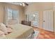 Bright bedroom includes plenty of natural light, a large window, and comfortable furnishings at 17056 W Bristol Ln, Surprise, AZ 85374