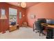 This office includes a desk, chair, two windows, and ample space at 17056 W Bristol Ln, Surprise, AZ 85374