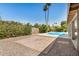 Paver patio and landscaping complement the refreshing pool in the private backyard at 2406 S Mulberry --, Mesa, AZ 85202