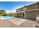 Spacious backyard with refreshing pool and covered patio, ideal for outdoor living at 2406 S Mulberry --, Mesa, AZ 85202