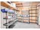 Unfinished basement with pegboard and wire shelving for storage and organization at 2406 S Mulberry --, Mesa, AZ 85202