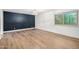 Bedroom featuring natural light, modern lighting, and hardwood floors at 2406 S Mulberry --, Mesa, AZ 85202