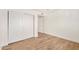 Bright bedroom with closet, and wood-look laminate flooring at 2406 S Mulberry --, Mesa, AZ 85202