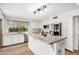 Updated kitchen with granite countertops, stainless steel appliances and a stylish light fixture at 2406 S Mulberry --, Mesa, AZ 85202