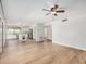 Bright and open living room with a view of the modern kitchen and hardwood floors at 2406 S Mulberry --, Mesa, AZ 85202