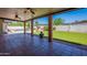 Backyard featuring a covered patio and artifical grass at 2446 E Hale St, Mesa, AZ 85213