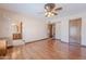 Spacious bedroom featuring hardwood floors and a ceiling fan at 2446 E Hale St, Mesa, AZ 85213