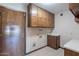 Practical laundry room offers extra storage at 2446 E Hale St, Mesa, AZ 85213