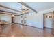 The living room has exposed beam ceilings and light wood flooring at 2446 E Hale St, Mesa, AZ 85213