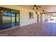 Covered patio with tiled floors overlooking artifical grass at 2446 E Hale St, Mesa, AZ 85213