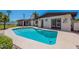 Outdoor pool featuring a clear blue water, tile border, patio and landscaping at 2446 E Hale St, Mesa, AZ 85213