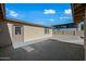 Backyard featuring a neutral colored wall and gravel at 2601 N 51St St, Phoenix, AZ 85008