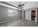 Bedroom with natural light, wood-look floors, and neutral walls at 2601 N 51St St, Phoenix, AZ 85008