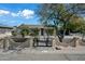 A charming single-story home, featuring a decorative fence with a secure gated entry for privacy and curb appeal at 2601 N 51St St, Phoenix, AZ 85008