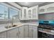 Close-up of the kitchen sink, countertops and cabinets at 2601 N 51St St, Phoenix, AZ 85008