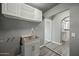 Utility room with sink and cabinetry at 2601 N 51St St, Phoenix, AZ 85008