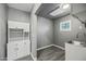 Utility room with cabinetry and sink at 2601 N 51St St, Phoenix, AZ 85008