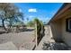 A tranquil side yard with decorative gravel and privacy fencing, providing a serene outdoor space at 2601 N 51St St, Phoenix, AZ 85008