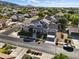 Stunning two-story home boasting a manicured front yard and attached carport nestled in a suburban community at 2822 E Constance Way, Phoenix, AZ 85042