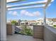 Outdoor balcony overlooking the neighborhood, offering views of nearby homes and blue skies at 2822 E Constance Way, Phoenix, AZ 85042