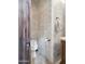 Well-designed bathroom with marble tile and modern fixtures, exuding cleanliness and style at 2822 E Constance Way, Phoenix, AZ 85042
