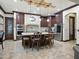 Gourmet kitchen with stainless steel appliances, granite countertops, a kitchen island, and custom cabinetry at 2822 E Constance Way, Phoenix, AZ 85042