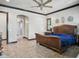 Luxurious main bedroom featuring elegant architectural details and a large archway leading to the bathroom at 2822 E Constance Way, Phoenix, AZ 85042