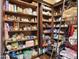 Walk-in pantry features ample shelving for dry goods, canned foods, and household supplies at 2822 E Constance Way, Phoenix, AZ 85042