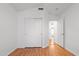 Bright bedroom with closet and view to another room, showcasing the home's layout at 316 W Kelton Ln, Phoenix, AZ 85023