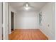 Bright bedroom with wood floors, closet and window at 316 W Kelton Ln, Phoenix, AZ 85023