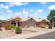 Street view of homes in a residential neighborhood with desert landscaping and neutral-colored exteriors at 316 W Kelton Ln, Phoenix, AZ 85023
