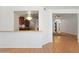 Bright living space showcasing kitchen view with wood cabinets and chandelier lighting at 316 W Kelton Ln, Phoenix, AZ 85023