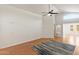 Bright living room featuring wood flooring, high ceilings, and neutral paint at 316 W Kelton Ln, Phoenix, AZ 85023